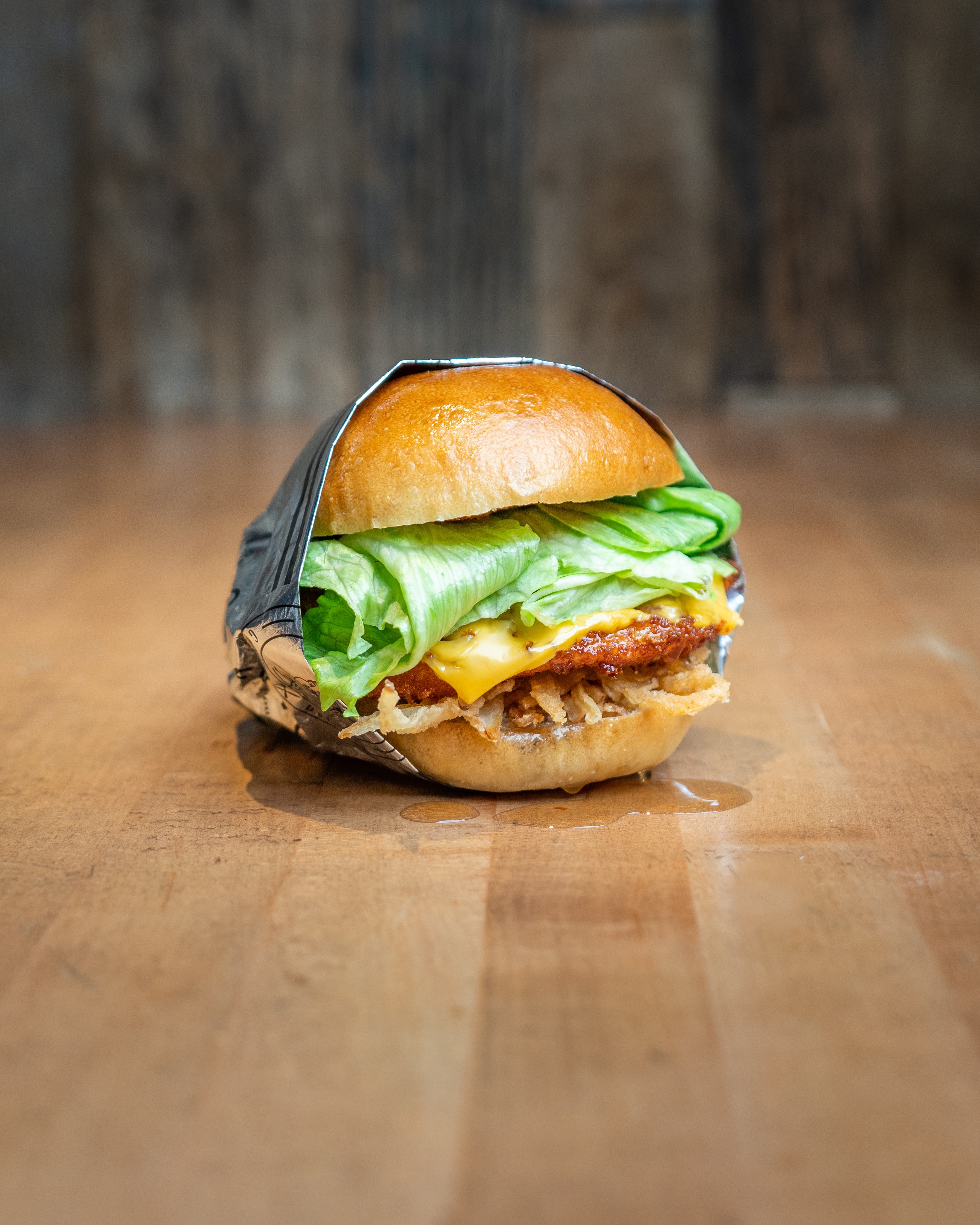 Maple Crisp Burger - Halal crispy chicken patty, hand-breaded fresh dai...